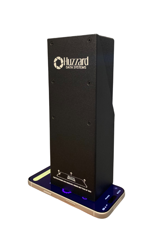 Sun-shielding outdoor access control enclosure HRIMS-OUT-ENC-KIT scanning a barcode on a smartphone screen.
